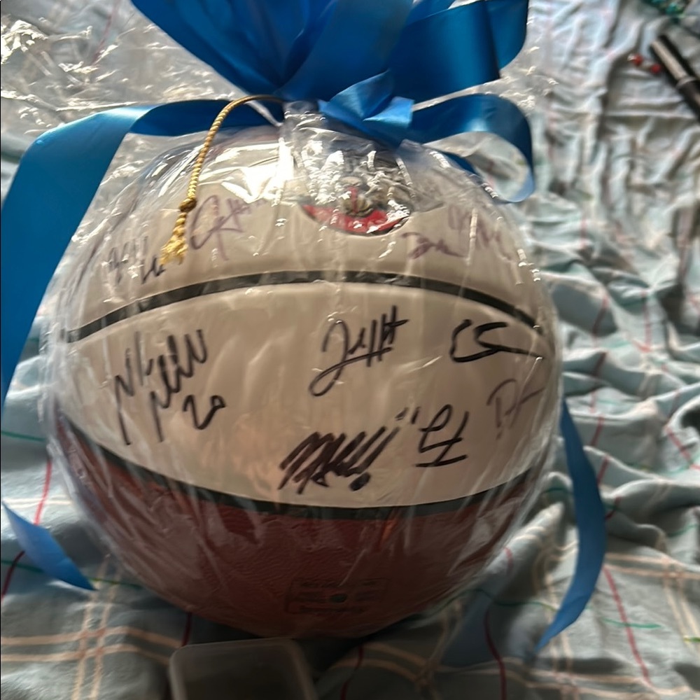 Autographed Basketball with Blue Ribbon